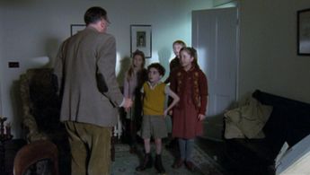 Anton Rodgers, Sam MacLintock, Matthew Henderson, and Chloe White in C.S. Lewis: Beyond Narnia (2005)