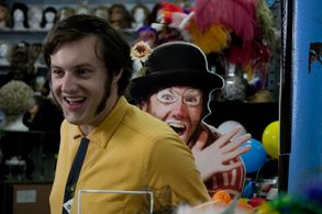 Trusty sidekick Garth (Zach Sutherland) prepares to help Eugene keep his identity secret.