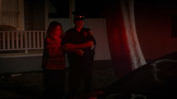 On the set of America's Most Wanted playing a cop