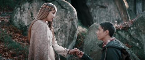 Danylo Kamenskyi and Eva Koshova in The Stronghold (2017)