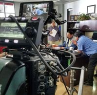 Director Daniel Ramos and actor Danny Trejo on the set 