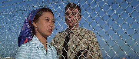 Edward Albert and Christina Kokubo in Midway (1976)