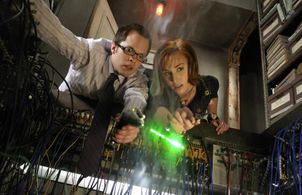 Neil Grayston and Allison Scagliotti in Warehouse 13 (2009)