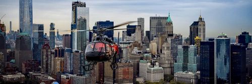 Nikon, National Geographic. Helicopter over Manhattan skyline, NYC. Kachina Dechert, Stuntwoman