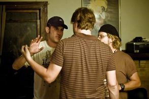 Director Brian Feeney discusses a shot with cinematographer Jeffrey Waldron while 1st assistant director Glenn Miller st