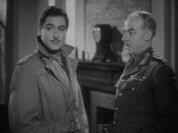 Robert Donat and Friedrich Richter in The Adventures of Tartu (1943)