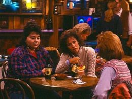 Roseanne Barr, Laurie Metcalf, and Natalie West in Roseanne (1988)