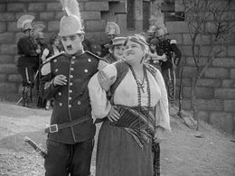 Charles Chaplin, Edna Purviance, and May White in A Burlesque on Carmen (1915)