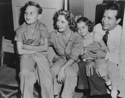 Joan Blondell, Dick Powell, Ellen Powell, and Norman S. Powell