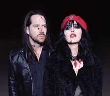 Danyell Souza & Tony F. on set of “Russian Roulette” music video for their band Dead Posey