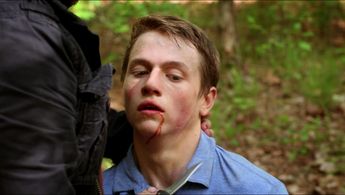 Still of Hunter Foretich and Simon Phillips in Dystopia (2019)