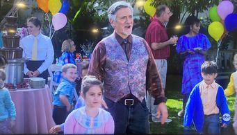 Carlos Lacamara and Gianna Bilby in The Goldbergs: Poker Night (2021)