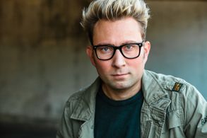 Alex Plank wearing army jacket