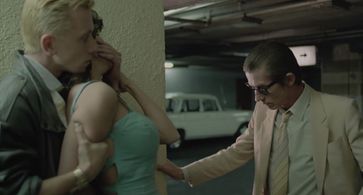 John Hurt, Tim Roth, and Laura del Sol in The Hit (1984)