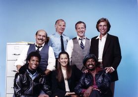 Taurean Blacque, Michael Conrad, René Enríquez, Veronica Hamel, Kiel Martin, Daniel J. Travanti, and Michael Warren in H
