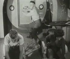 Henry Beckman, Irene Champlin, and Steve Holland in Flash Gordon (1954)