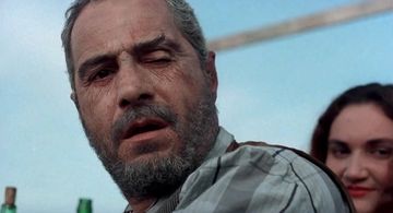 Nino Manfredi and Maria Luisa Santella in Ugly, Dirty and Bad (1976)