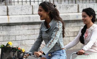 Kangana Ranaut and Lisa Haydon in Queen (2013)