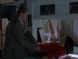 Corin Nemec and Musetta Vander in Mansquito (2005)