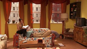 Still of Daniel Romer and Heather Ann Davis in Upstairs.