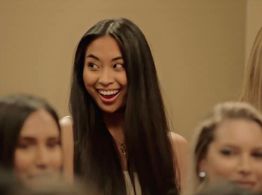 Daniella Dela Peña as an audience member in the Oprah's Bank Account music video directed by Director X featuring Lil Ya