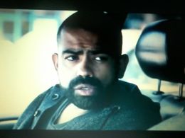 Eliezer Ortiz as Kris in the film Unexpected Guests.