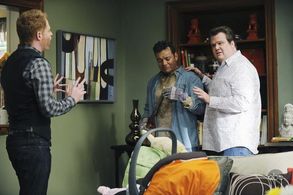 Jesse Tyler Ferguson, Eric Stonestreet, and Eddie Diaz in Modern Family (2009)