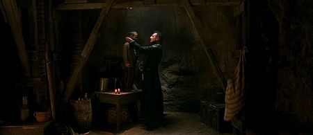 Liam Neeson and Cian McCormack in Gangs of New York (2002)