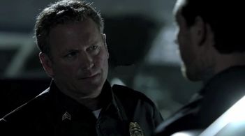 Tony Senzamici as Officer Stetz with Kevin Alejandro on the set of A & E Breakout Kings , episode Cruz Control