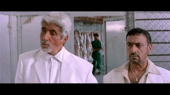 Amitabh Bachchan and Gulshan Grover in People Cover Story: Bachelorette Baby Boom (2003)