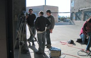 J.P. Riley discussing the next shot with his DP, Gaffer and Production Designer on Eli Emily's official music video for 