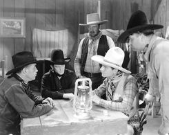 Ace Cain, Bill Cody, Earle Hodgins, Stuart James, and Roger Williams in The Texas Rambler (1935)