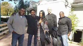 PICS WITH A FAN ON SET OF DARK IRIS