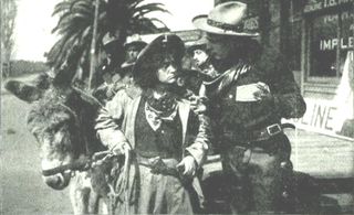 Louise Lester and Jack Richardson in Calamity Anne's Trust (1913)