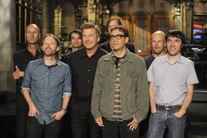 Alec Baldwin, Fred Armisen, Clive Deamer, Colin Greenwood, Jonny Greenwood, Ed O'Brien, Phil Selway, Thom Yorke, and Rad