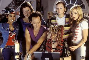 After waking up in the body of a 30-year-old man, Jessica (Rob Schneider, center left) and friends Keecia (Maritza Murra