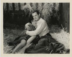 Fifi D'Orsay and Reginald Denny in Those Three French Girls (1930)