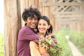 Dhanush and Amyra Dastur in Anegan (2015)