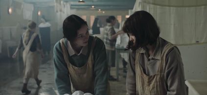 Abby Fitz and Ciara Stell in The Woman in the Wall (2023)