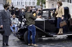Lucas Bravo, Anthony Fabian and Lesley Manville on the set of Mrs. Harris Goes to Paris