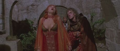 Tia Carrere and Edward Tudor-Pole in Kull the Conqueror (1997)