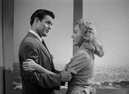 James Cardwell and Lynn Merrick in Voice of the Whistler (1945)