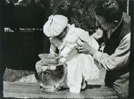 Auguste Lumière and Andrée Lumière in Fishing for Goldfish (1895)