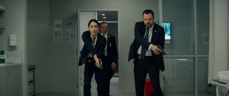 Sandrine Holt, Michael Gladis, and Griff Furst in Terminator Genisys (2015)