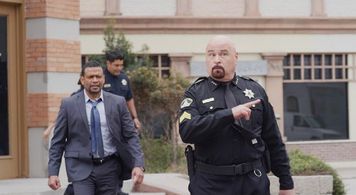 Michael Balin and Mario Van Peebles in A Clear Shot