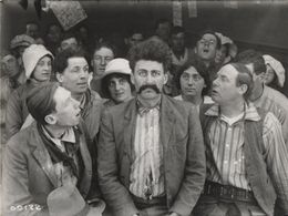 Augustus Carney, Fred Church, Victor Potel, Evelyn Selbie, and Harry Todd in Alkali Ike and the Hypnotist (1913)