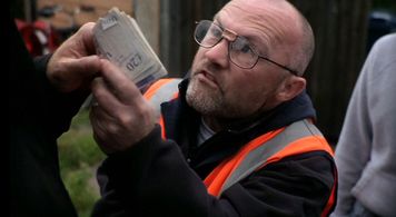 Sean Connolly as Postie in 'The Shop'