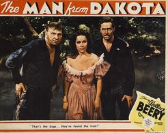 Wallace Beery, Dolores del Rio, and John Howard in The Man from Dakota (1940)