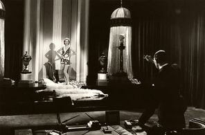 Lucien Prival and Genevieve Tobin in Hollywood Speaks (1932)