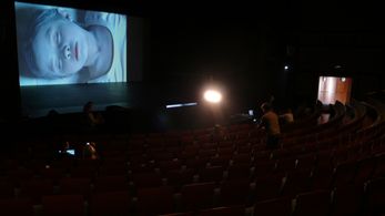 Video image of child by Gottfried Helnwein for the Israeli Opera, THE CHILD DREAMS.